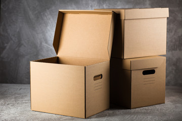 Cardboard box on grey background