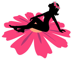Young woman (silhouette) sitting on a big chamomile