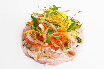 tartar with tuna and vegetables on a white background