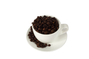 White cup with coffee beans