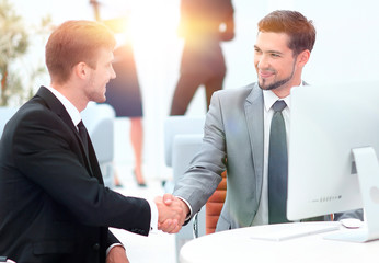 handshake Manager and the client in the office.