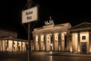 Germany, Berlin, Pariser Platz: Detail of illuminated Brandenburg Gate (Brandenburger Tor) at night in the middle of the German capital. The monument was built by king Frederick William II.