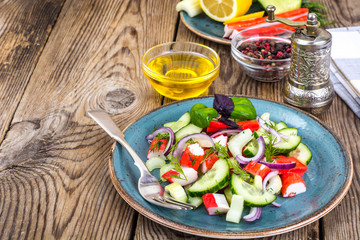 Spicy surimi salad on blue plate