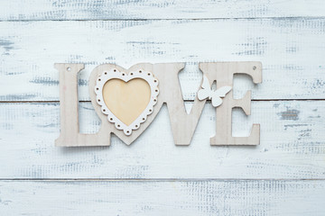 white love letter on white wooden background