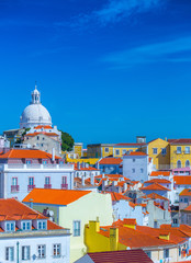 Summertime sunshine day cityscape in the Alfama - historic old district Alfama in Lisbon, Portugal.