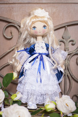 Handmade doll in the interior.