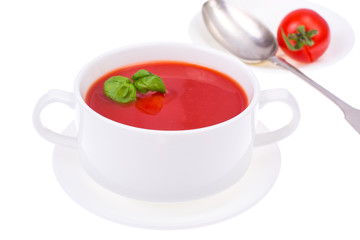 Delicious tomato soup on white background