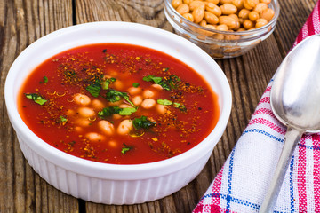Canned white beans in tomato sauce. Spicy food