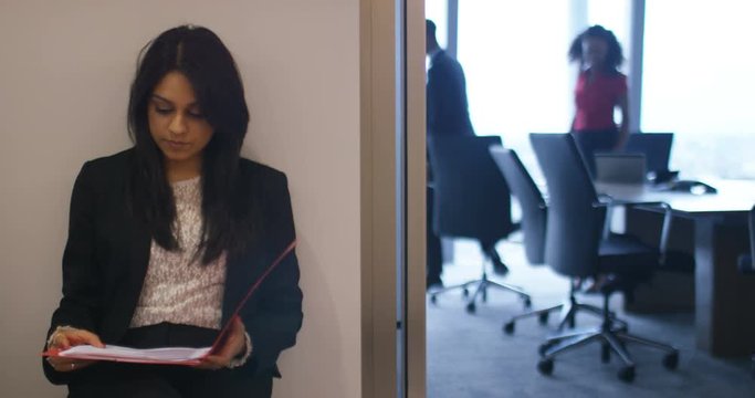 4K Young candidate waiting to be seen for job interview in corporate office