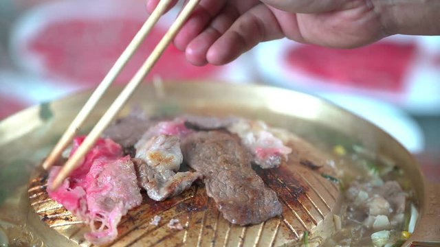 Korean BBQ Pork on brass pan 