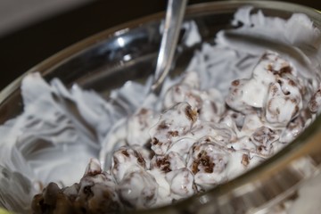 Oat flakes with yogurt in a glass bowl. Slovakia