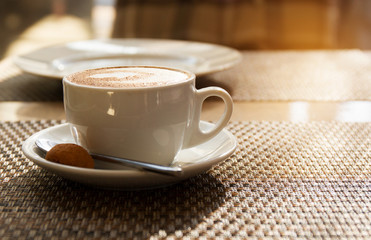 Morning coffee, cappuccino on the table