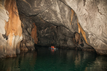 Boats at cave of Puerto Princesa subterranean underground river on Palawan, Philippines - obrazy, fototapety, plakaty