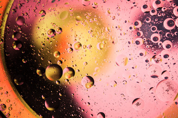 Abstract space background. Water drops of different colours