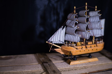 souvenir ship on a black background