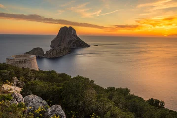 Fotobehang Oranje Savinar Tower and Es Vedra island at sunset, Ibiza, Spain  © Noradoa