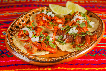tacos al pastor and lemon mexican food in mexico city spicy meat