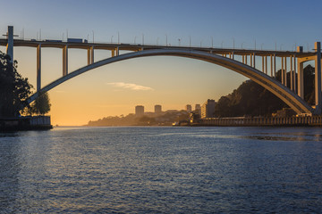 Fototapeta na wymiar Arrabida Bridge between Vila Nova de Gaia and Porto cities in Portugal