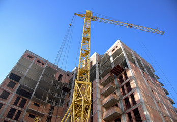 apartment building on blue sky background