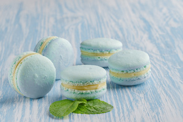 Blue macarons. French delicate dessert for Breakfast in the morning light