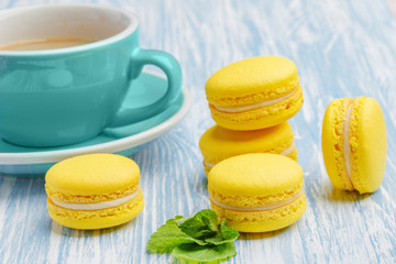 Yellow macarons. French delicate dessert for Breakfast in the morning light