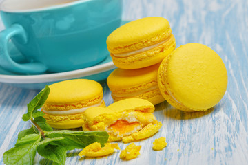Yellow macarons. French delicate dessert for Breakfast in the morning light