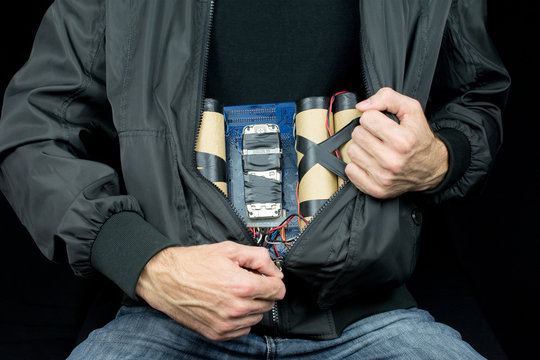 terrorist hides a bomb on his body, make bomb concept