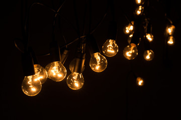 glowing light bulbs in the dark