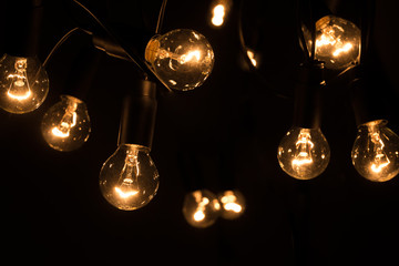 glowing light bulbs in the dark