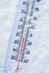 Thermometer in pure snow in frosty weather