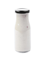 White sauce in a bottle isolated