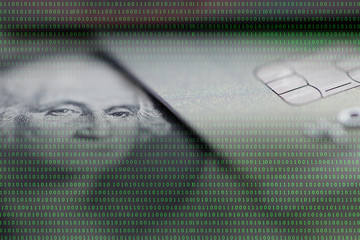 us dollar banknote and creditcard among binary code