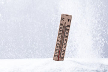 Thermometer On Snow Showing Low Temperature