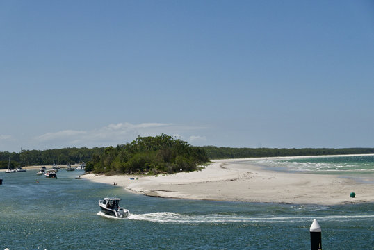 Huskisson harbour with beach and sea