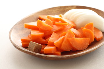 chopped carrot and onion with stock soup ingredient