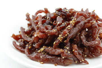 Sweet dried pork with sesame on white background