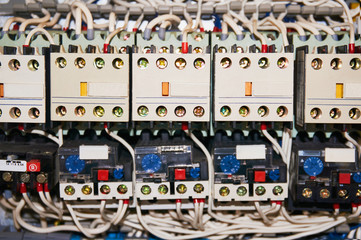 Electrical wires connected to the numbered relays.
