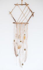 Dream catcher handmade on a white background