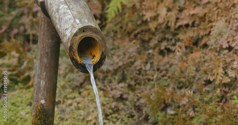 Poster water from bamboo fountain