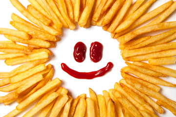 Smiling sun with rays. French fries  and a face with a smile from ketchup isolated on white background