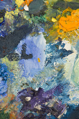 Fototapeta na wymiar Artists acrylic paint palette close up semi abstract background