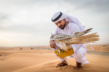 Arabic man in the desert with his hawk