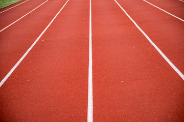 red running track for background.