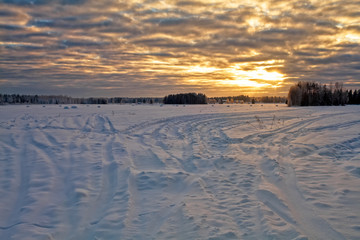 Dramatic Sky Over The Snowy Fields