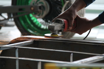 worker welding the steel