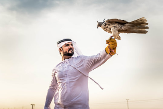 Arabic man in the desert with his hawk