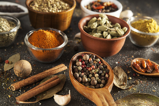 spices, variety of colorful aromatic spices, pepper, mustard, chili, coriander, cinnamon, cardamom