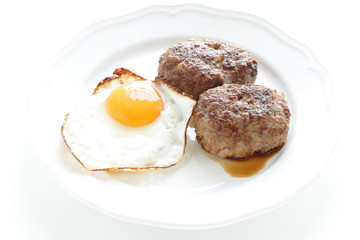 homemade patty and sunny side up fried egg