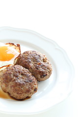 homemade patty and sunny side up fried egg