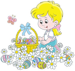Easter egg hunt. Little girl with a decorated basket collecting colorfully painted eggs among white daisies